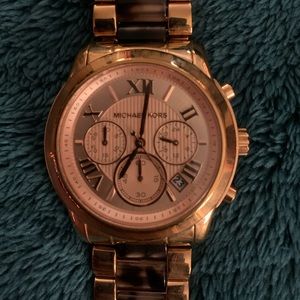 Women’s Michael Kors rose gold/ tortoise watch